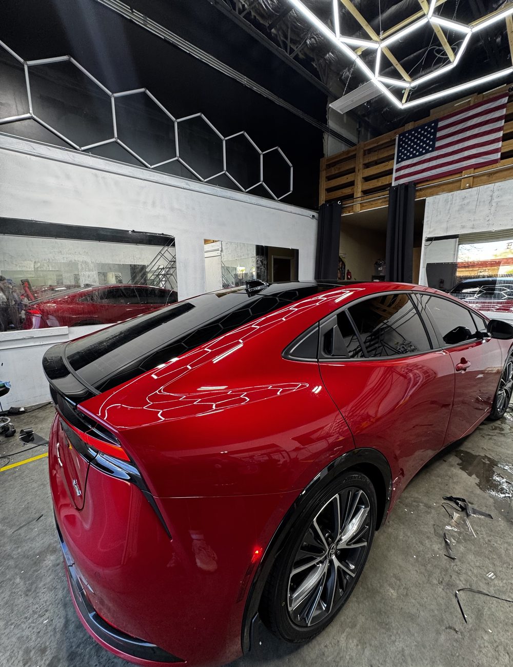 Red Toyota Mirai tinted rear