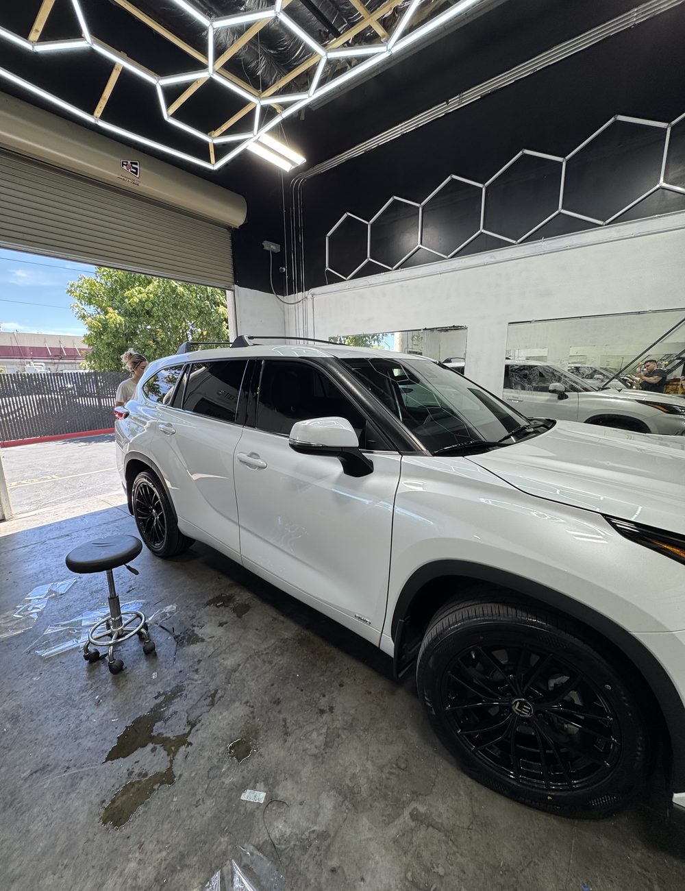 White Toyota Highlander tint install